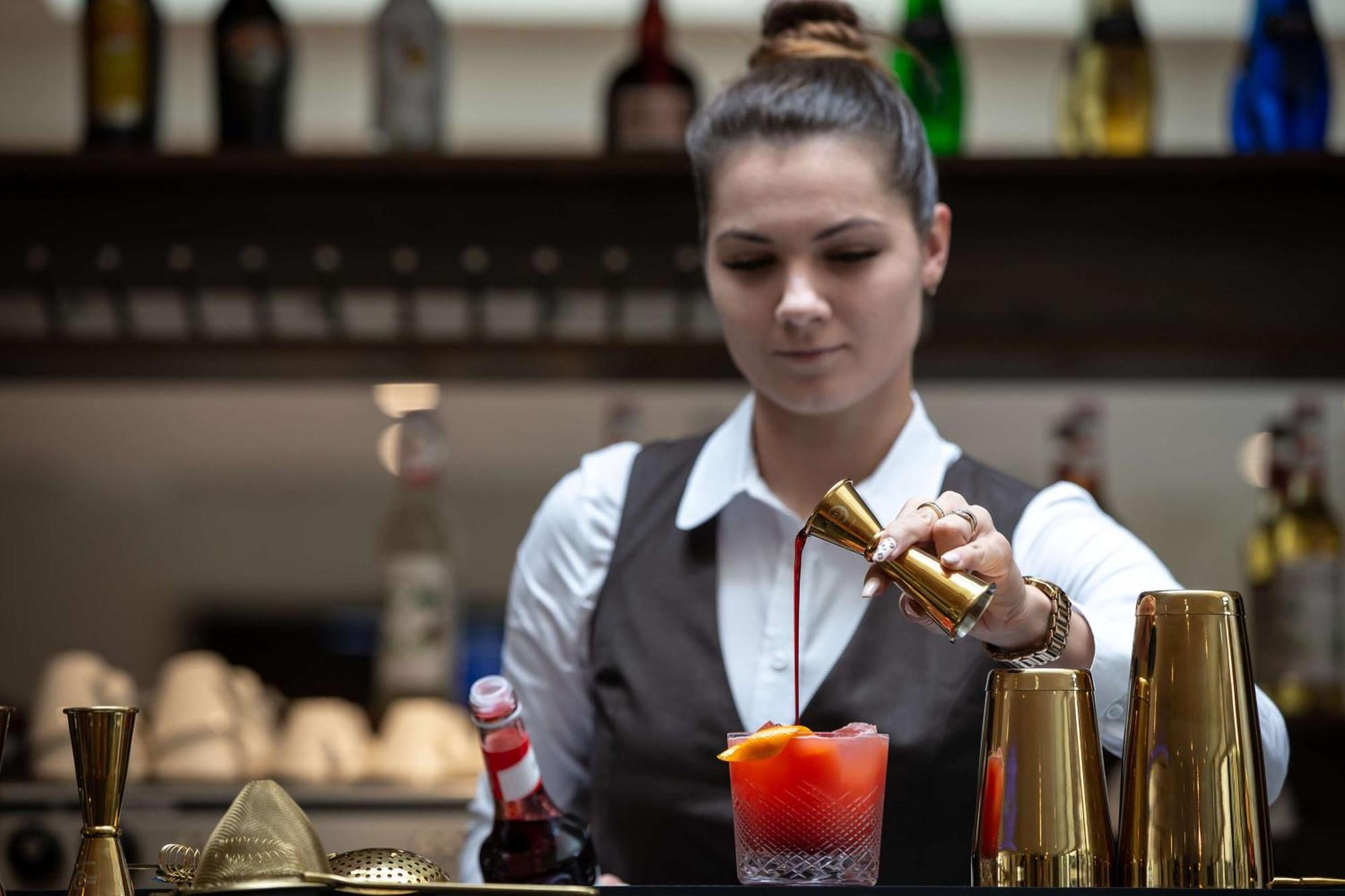 Radisson Blu Hotel & Residences Zakopane Zewnętrze zdjęcie A bartender at work